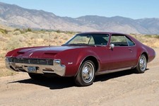 1966 Oldsmobile Toronado Maroon 24x36 Inch Poster Classic Car 1966 Oldsmobile Toronado Maroon 24x36 Inch Poster Classic Car