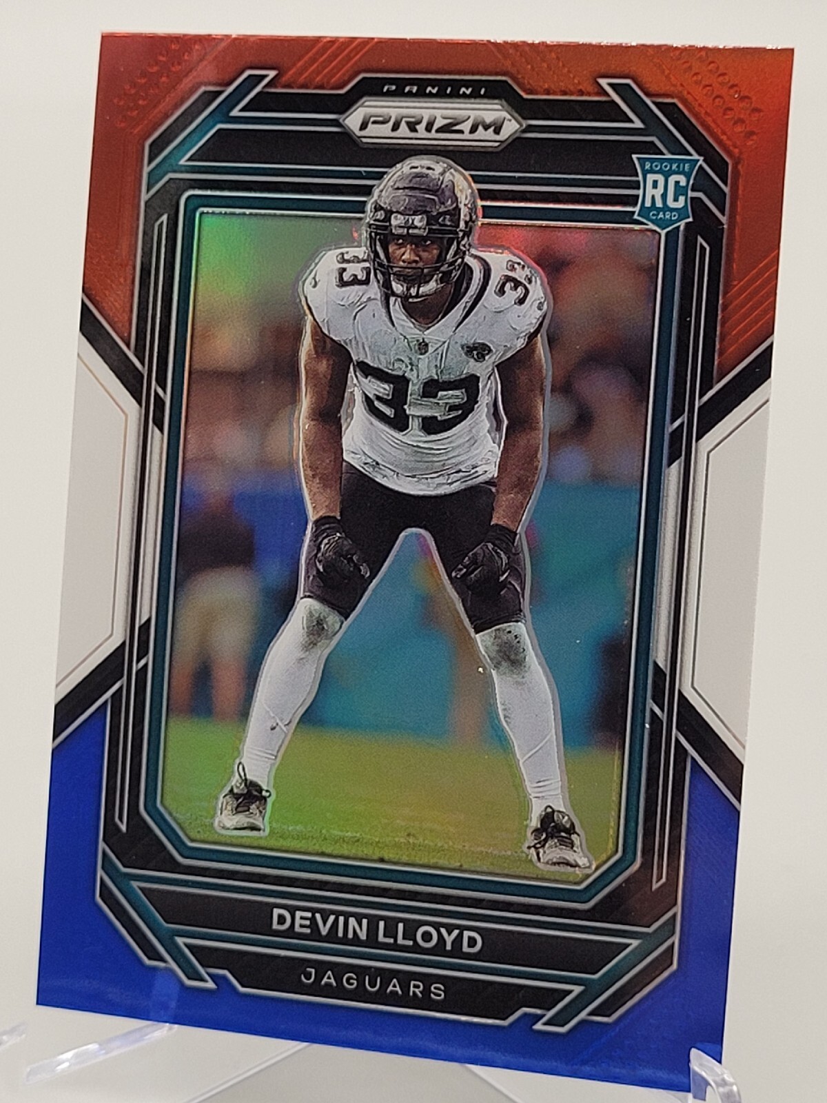 2022 PANINI PRIZM DEVIN LLOYD RED WHITE BLUE PARALLEL CARD ROOKIE JAGUARS 376
