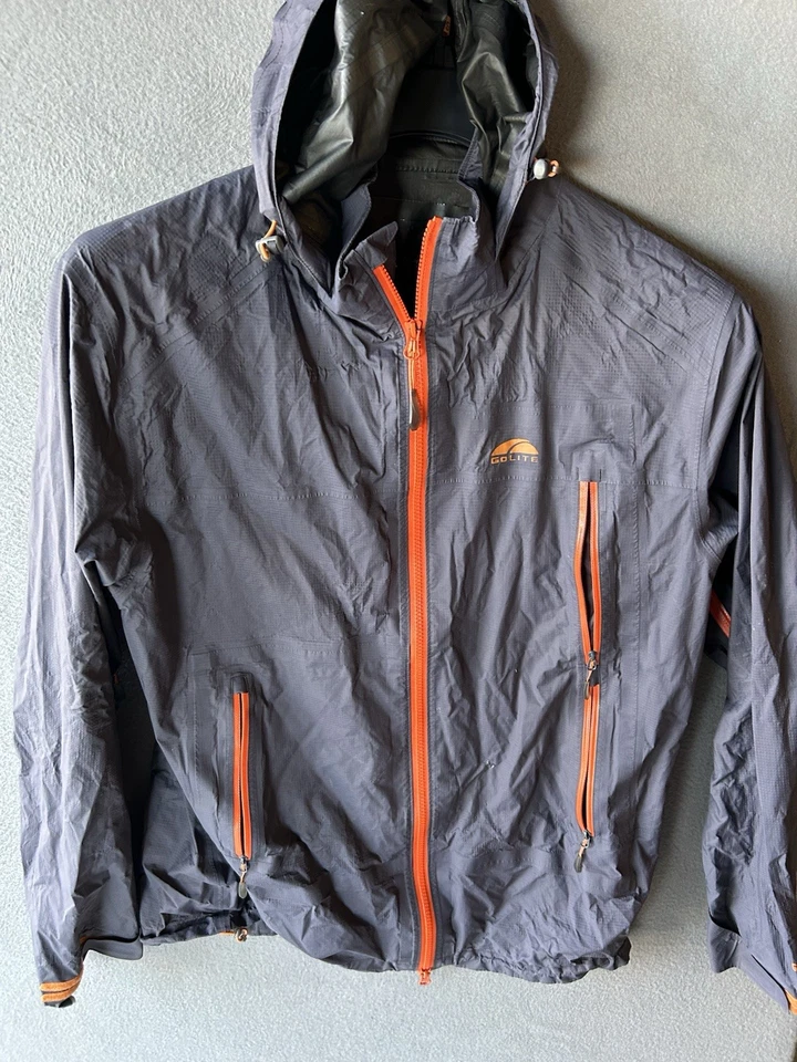 Chaqueta de lluvia ligera con capucha GoLite para hombre L gris naranja cremallera senderismo concha Foto 2 de 4