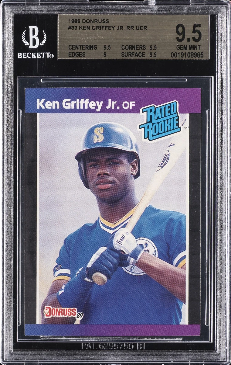 ken griffey jr. graded cards Jr Signed Mariners 1990 Topps #336 Rookie Card BAS Super Sports Center Slabbed Baseball Card Backed by the PSA/DNA 100% Authenticity Guarantee Slabbed and Authenticated by PSA/DNA Featured is a Ken Griffey Jr Lot Detail - 1989-2000 Group