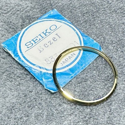 NOS BEZEL FOR VINTAGE SEIKO MODELS SEE DESCRIPTION 83337501 GOLD