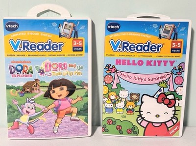 Set Of 2 VTech V.Reader Cartridge - Hello Kitty And Dora The Explorer Ages 3-5