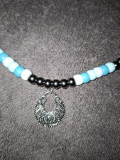 Rhythm beads white turquoise & silver. shet size. Adjustable Handmade to order