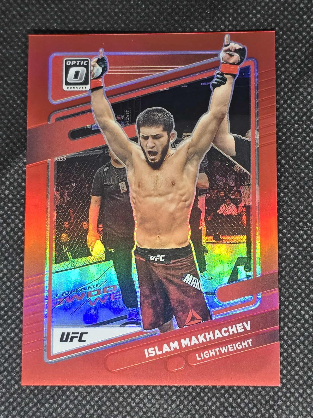 2022 Donruss Optic UFC Islam Makhachev #12 Red /199 Lightweight Champion