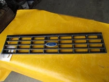 81-84 Escort Chrome Grille w/Blue Oval emblem