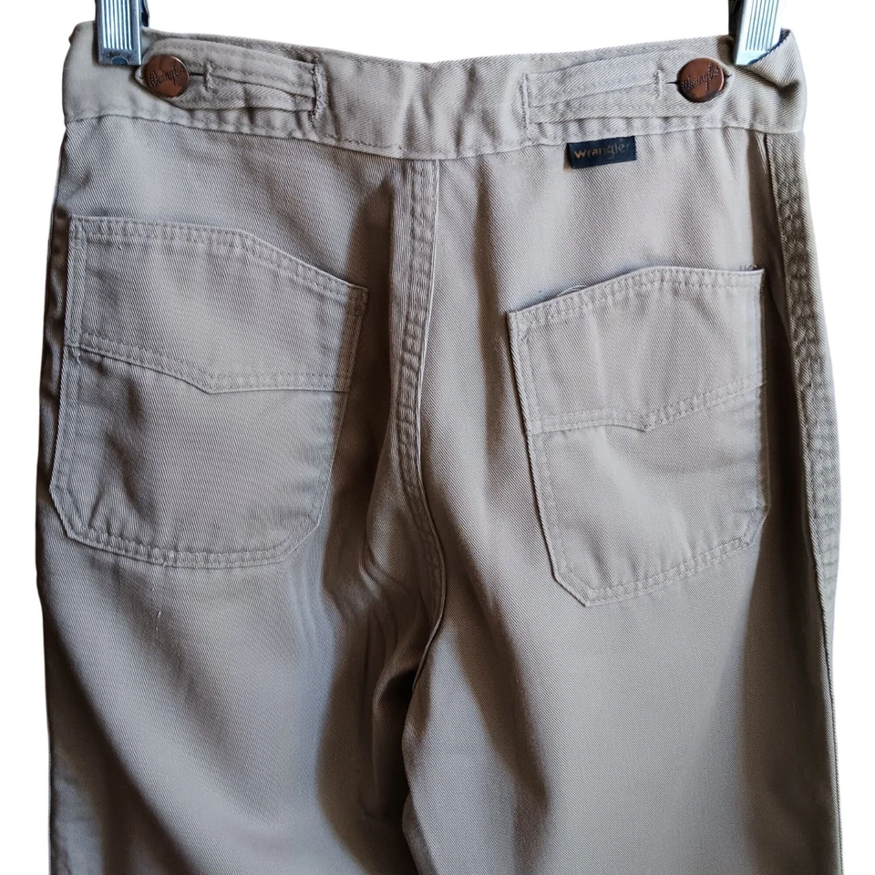 Pantalones de mezclilla discoteca Wrangler caqui con fondo de campana 24x30 vintage años 70 detalles con botones Foto 3 de 4