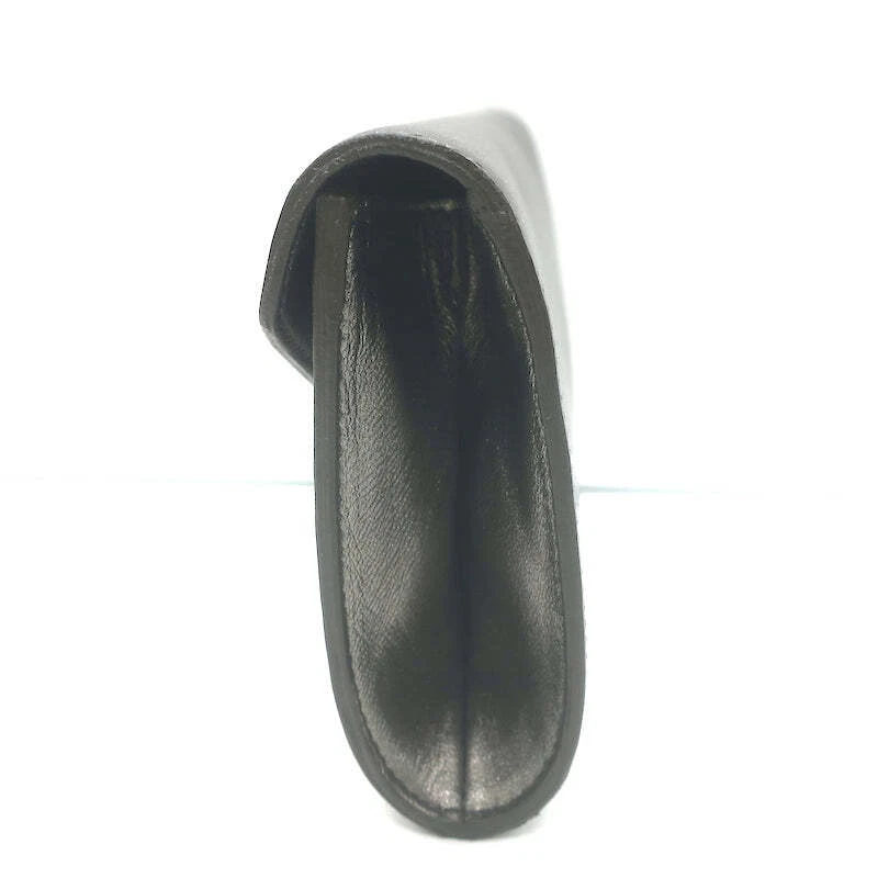 Bolso sin asas Yves Saint Laurent pequeño sobre cuero metálico Gunmetal Foto 4 de 4