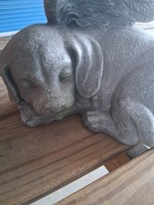 This item is a decorative pet memorial statue featuring a sleeping dog with...