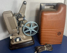 Revere Model 48 16mm Film Projector w/ case, cord, reel. WORKING See video