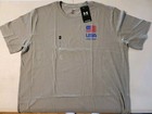 MEN'S UNDER ARMOUR SIZE 2XL FREEDOM GRAPHICS ON FRONT AND BACK LOOSE FIT IS GRAY