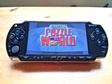 Sony PSP 2003 Slim Console. Tested. c/w Charger, Memory and Case. VGC.