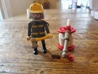 Playmobil #3882 Firefighter Figure COMPLETE with hose and fittings Vintage 1997