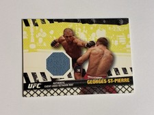 2010 Topps UFC Series 4 Georges St-Pierre UFC 56 Fight Mat Relic Card #FM-GSP