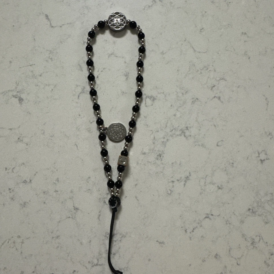 Dije de teléfono Casetify - negro Foto 4 de 4