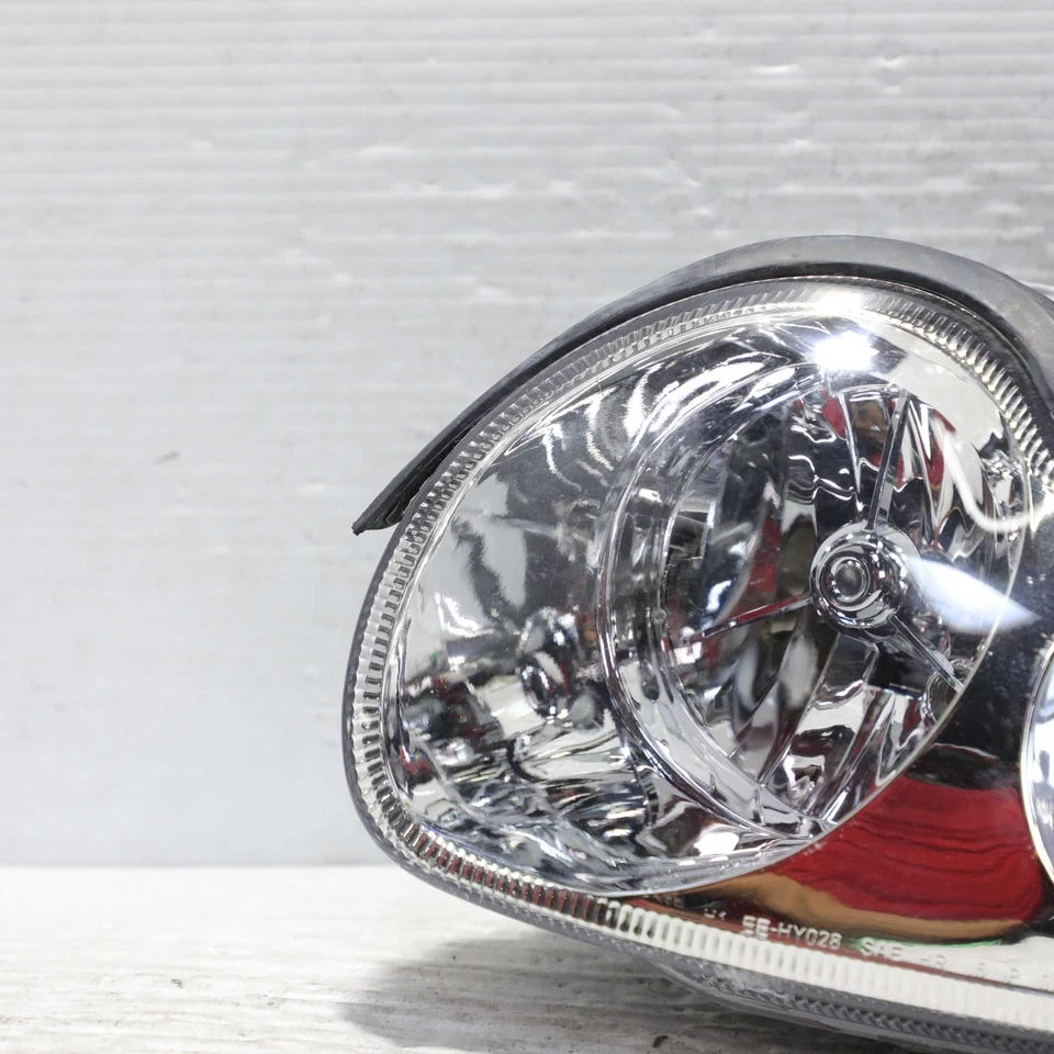 Faro halógeno lateral izquierdo Hyundai Sonata 2002-2005 mercado de accesorios Eagle Eyes Foto 3 de 4