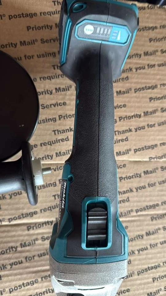 Amoladora angular Makita DGA404 18V 125mm máquina de corte recargable (solo herramienta) Foto 2 de 4