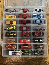 Case of Cars: Hot Wheels first photo is all Hot Wheels  2 on the other side .