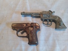 2 Vintage die cast toy cap guns. J. E. Stevens Co. 25 JR. and texas 6 shooter