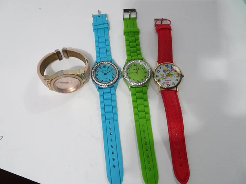 Lot of 4 Geneva Platinum Watches. Untested.