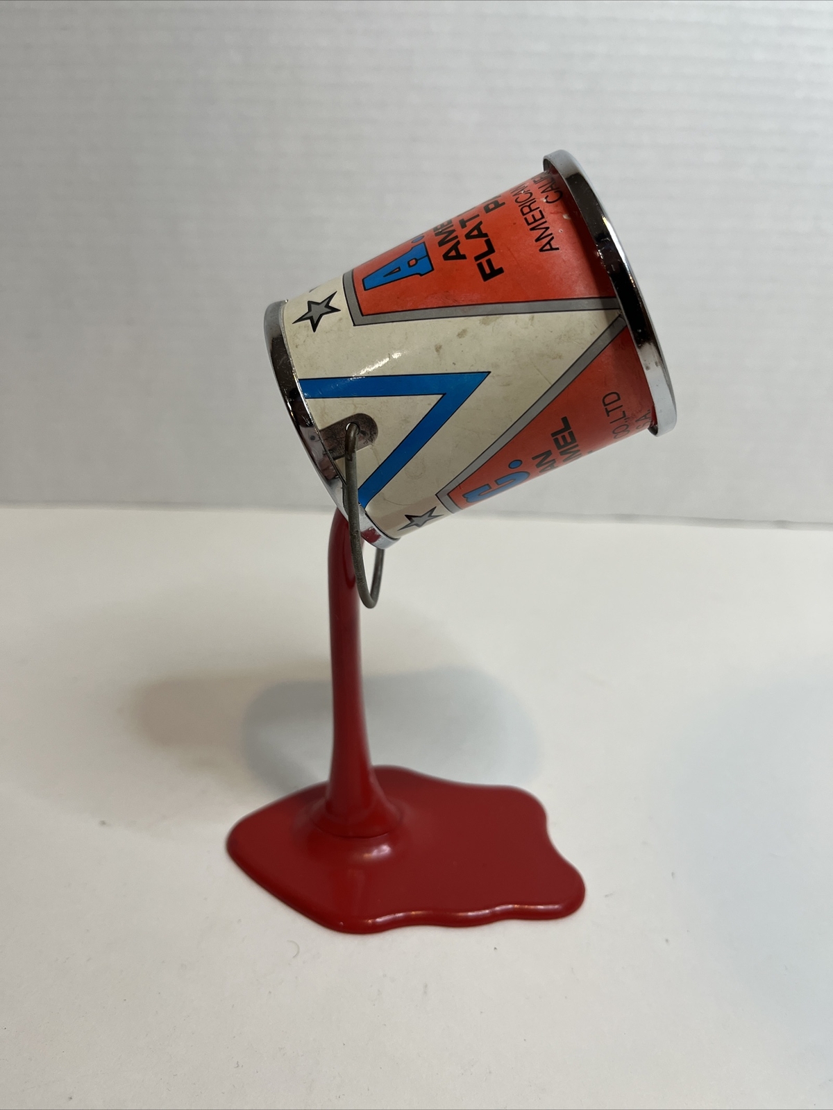 Vintage APC American Enamel Paint Can Coin Bank Spilling Pouring