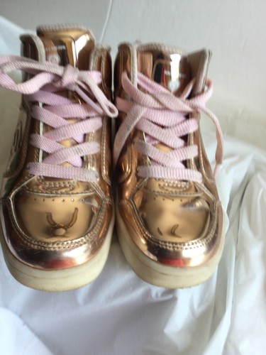gold colored tennis shoes