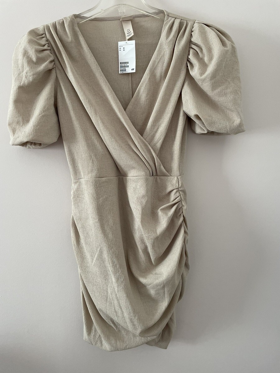 beige puffy dress NWT H&M Faux Wrap Mini Balloon Sleeve Ruched V-Neck Medium _okendo:syndication_key:CL137598001 Belted Trench Dress in Aline sweetheart neck tulle Taelor ID:pseudo-10585