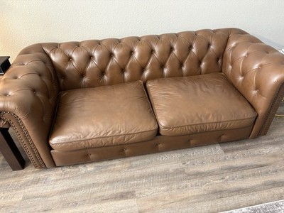 Six piece couch with a coffee table and two other tables  