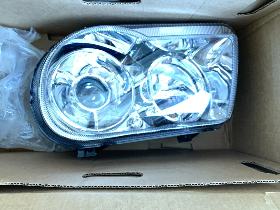 Faro izquierdo original Mopar 57010863AA -001 l 57010863AA Foto 2 de 4