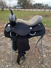 Used 15" black synthetic Western saddle