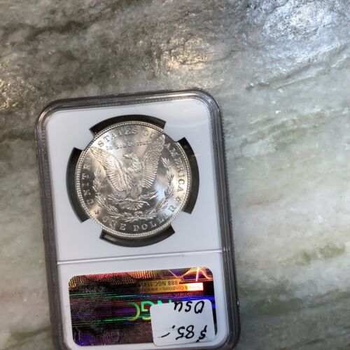 1885 Silver Morgan Dollar NGC MS63 - Picture 2 of 2