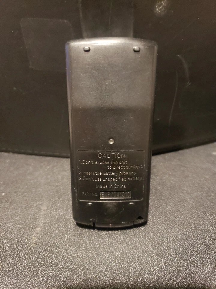 Control remoto de audio para automóvil Panasonic original genuino EUR7641010 - batería nueva con lengüeta de tracción Foto 3 de 4