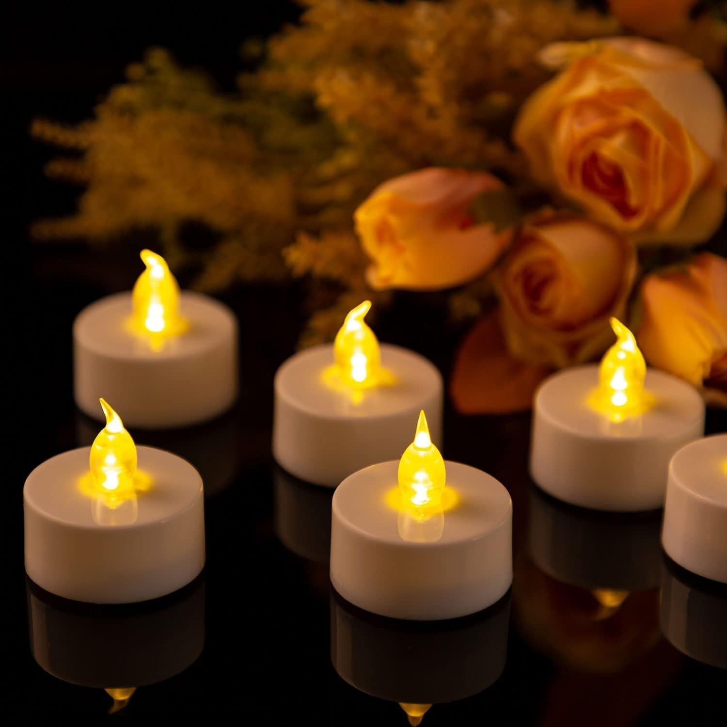 "LED Tea Lights with 6-Hour Timer: 12 Warm Yellow Flickering Candles for Events
