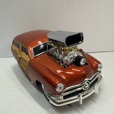 Funline Muscle Machines Tangerine Orange 1950 Ford Woody Die Cast Car 118