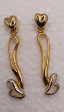 Orecchini pendenti palo cuore lungo placcato oro e argento con look Salvador Dalì