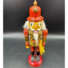 Nutcracker 10 inch Red Hat Sword on Side Yellow Ribbon 