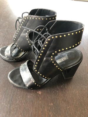 black heels with gold studs