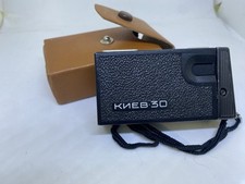 Vintage KGB film camera, KYIV 30, Soviet spy subminiature camera with lens