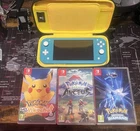 Nintendo Switch lite + Pokemon Games