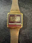 Vintage 1980s Timex Command Bar LCD Quartz Watch Maroon And Gold Colored