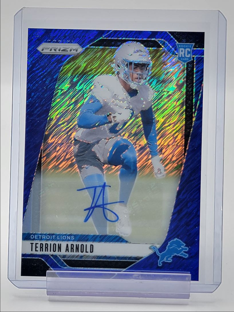 TERRION ARNOLD 2024 PANINI PRIZM ROOKIE BLUE SHIMMER LIONS RC AUTO /25 Q3549