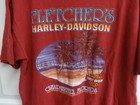 Men’s XL T-shirt with blue “Fletcher’s Harley-Davidson Clearwater, FL” text and tropical tree graphics.