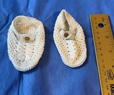 Lot of vintage homemade crocheted baby shoes and bibs to wear or for decoration