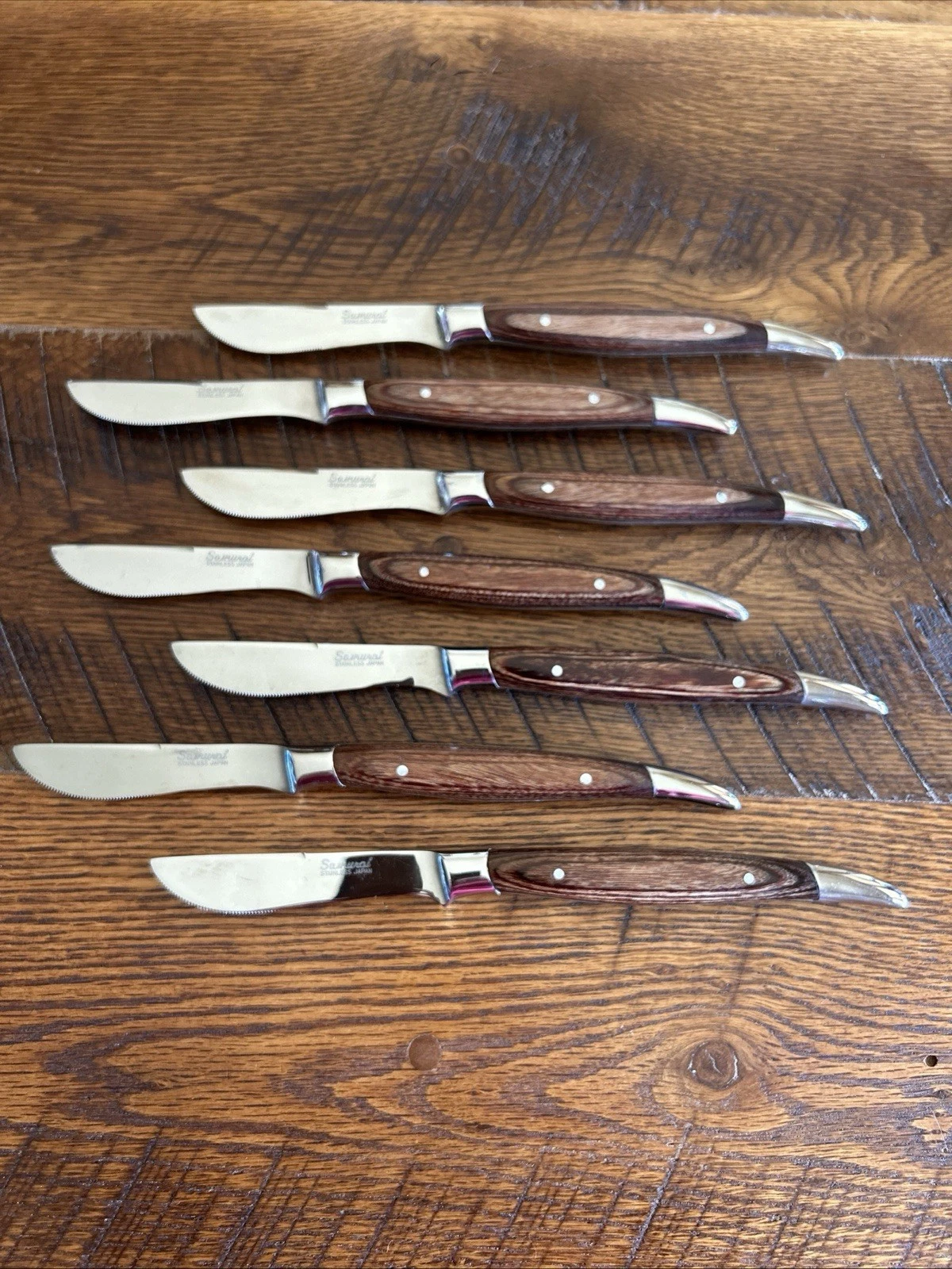 Samuri Stainless Steel Japan Serrated Edge Wood Handle Steak Knives Set of 7
Opens in a new window o