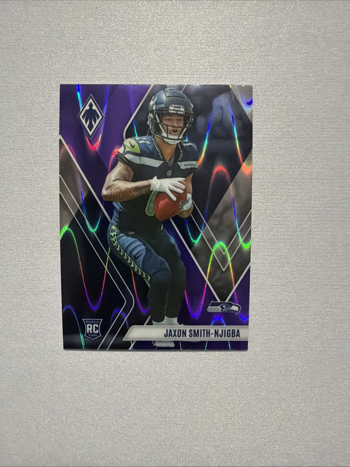 2023 Panini Phoenix - Rookies Jaxon Smith-Njigba #106 Purple /125 (RC)