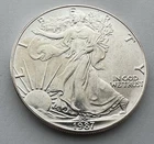 1987 American Silver Eagle BU Light Original 1 oz Of  .999 Fine Silver