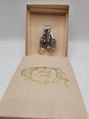 KIRKS FOLLY SILVERTONE CRYSTAL BABYS FIRST YEAR CHRISTMAS TREE BROOCH K878A