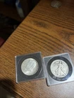 lot of two half dollar coins silver / 1935 - 1964 / with caase