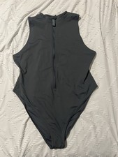 SKIMS Swim Women s Zip Front Sleeveless Solid...