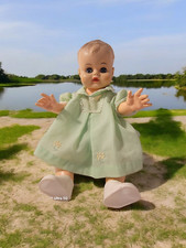 Vintage 17-inch baby doll molded hair wearing vintage dress/bloomers