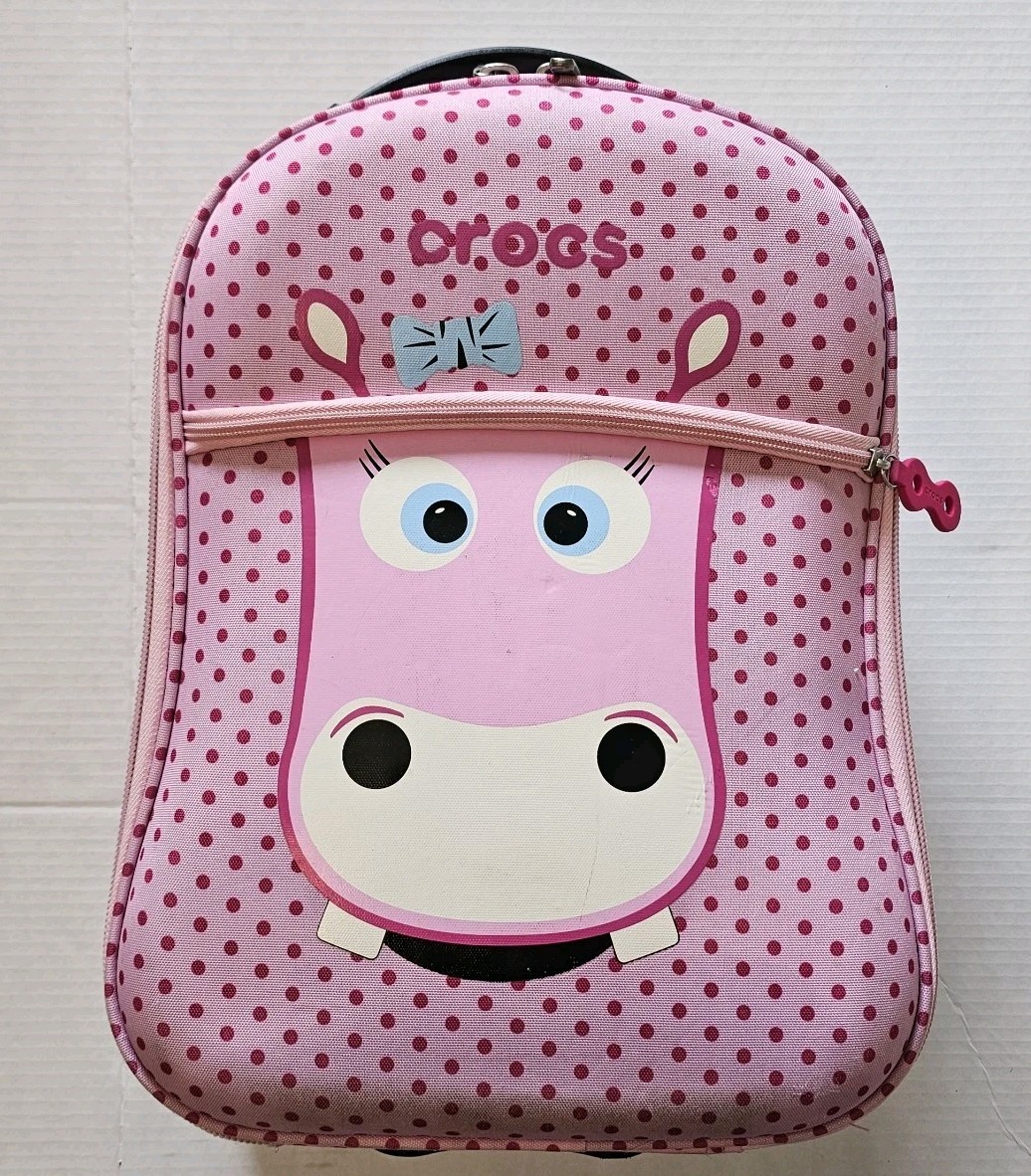 Maleta juvenil Crocs con asa y ruedas. Estado usado. Ideal para viajar